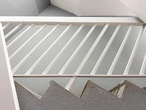 Minimal geometric staircase with sharp shadows 스톡 사진