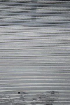 Minimal gray metal rolling shutter texture background Stock Photos
