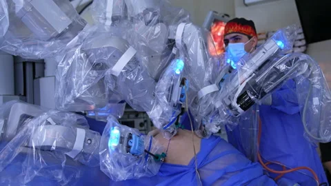 Minimal invasion surgery performed by the robot surgeon.  Stock Footage 234761773