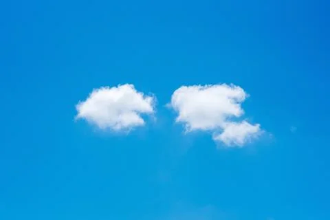 Minimal nature white cloud on blue sky background in daytime Photos