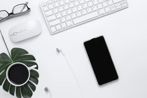 Minimal Office desk table top view Stock Photos