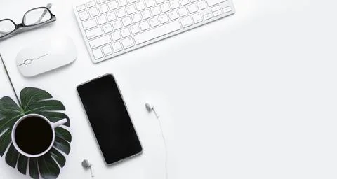 Minimal Office desk table top view with Keyboard computer, mouse, white pen,  Stock Photos
