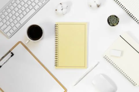 Minimal Office desk table top view with office supply and coffee cup on a w.. Stock Photos