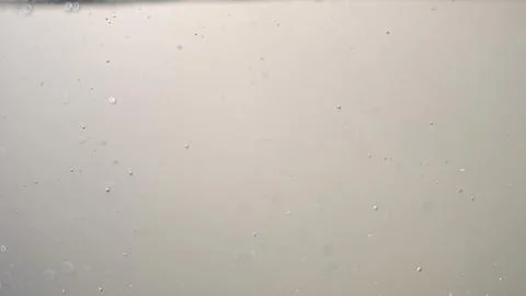 Minimal Pale Liquid Texture with Bubbles Stock Photos