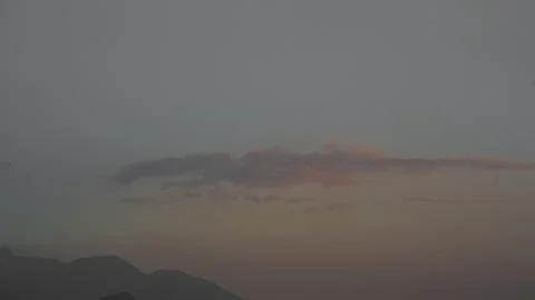 Minimal Pink Dusk Cloud Over Dark Mountain Silhouette Stock Photos