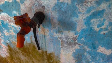Minimal Plastic Wall Faucet: Functional and Reliable Water Access Stock Photos