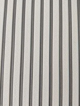 Minimal ribbed concrete texture background with linear industrial pattern 스톡 사진