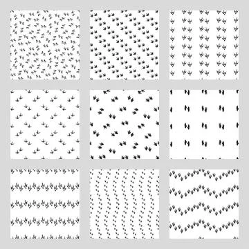 Minimal seamless patterns with dinosaur foots. Black and white colors Stock Illustration