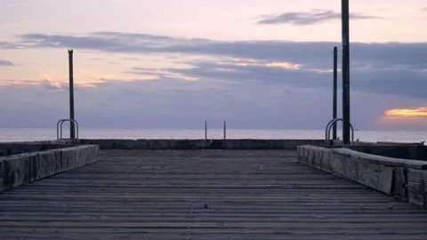 Minimal shot of a pier at sunset Stock Footage 168481676
