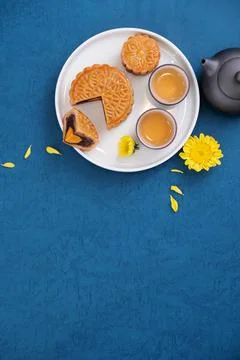 Minimal simplicity layout moon cakes on blue background for Mid-Autumn Festiv Stock Photos