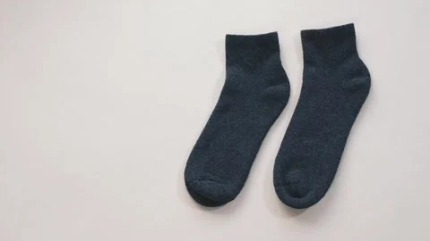 Minimal socks on white background isolated object studio shot Vídeo Stock 340469985