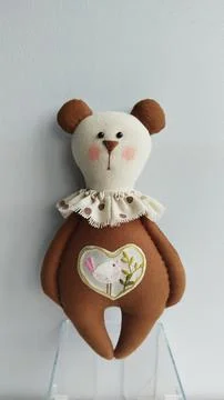 Minimal teddy bear plush on white background Stock Photos