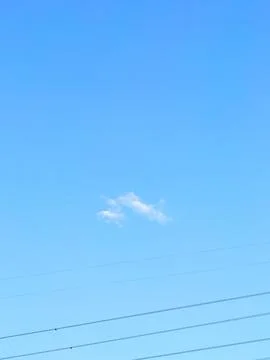 Minimal white cloud on clear blue sky Foto stock