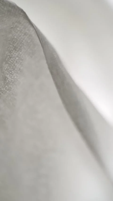 Minimal White Linen-Like Texture with Diagonal Fold Macro Stock Footage 331251058