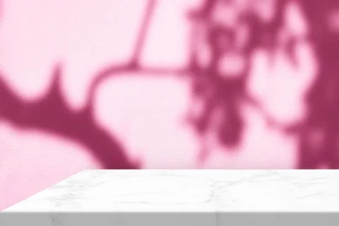 Minimal White Marble Table Corner with Shadow and Pink Light Beam Stock Photos