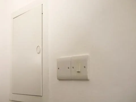 Minimal White Wall With Electrical Panel Stock Photos