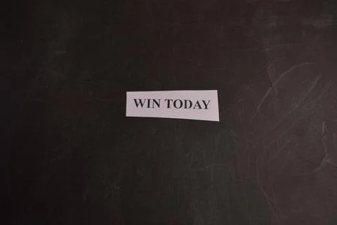 Minimal Win Today typography message card with dark textured backdrop Stock Photos