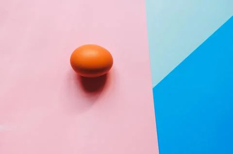Minimalism. one egg. background of three colors. Easter 스톡 사진