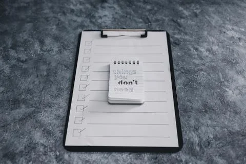 Minimalism or introspection concept, notepad with texts Things you dont need  Stock Photos