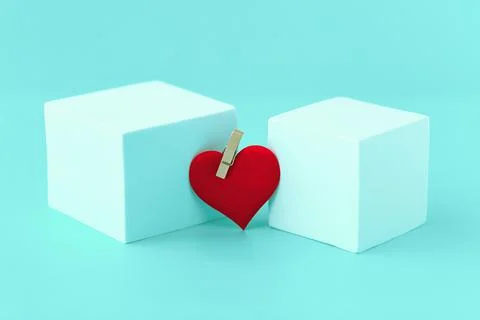Minimalism, two white cubes with a red heart in the middle, a conceptual phot Stock Photos