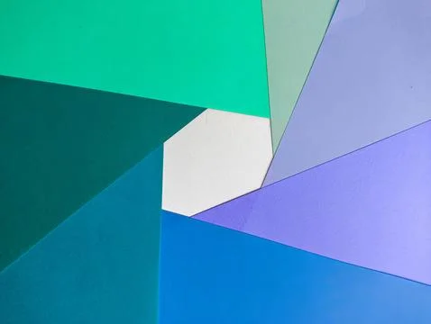 A minimalist abstract background with intersecting blue and green paper. Pe.. Stock Photos