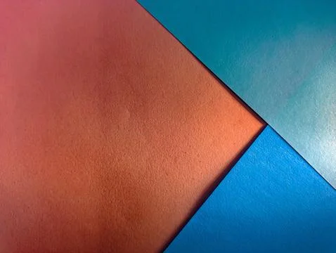 A minimalist abstract background with intersecting copper and blue. Modern .. Stock Photos