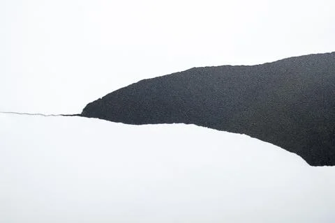 A minimalist abstract design element featuring a horizontal tapered strip o.. Stock Photos