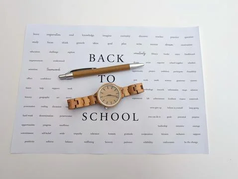 Minimalist back to school concept featuring a single sheet of word art with a Stock Photos