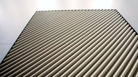 Minimalist background of beige fluted surface with diagonal lines Foto stock