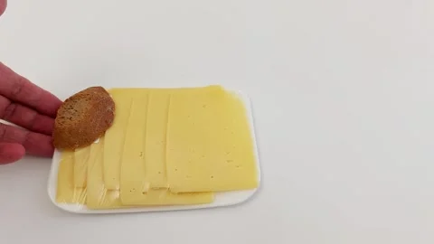 Minimalist Cheese and Bread Composition on White Ceramic Plate 스톡 동영상 321387555