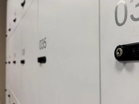 Minimalist Close Up View of Gray Storage Lockers in Corporate Office Stock Photos