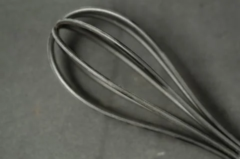 Minimalist composition highlights kitchen tool&amp;#039;s form. Stock Photos