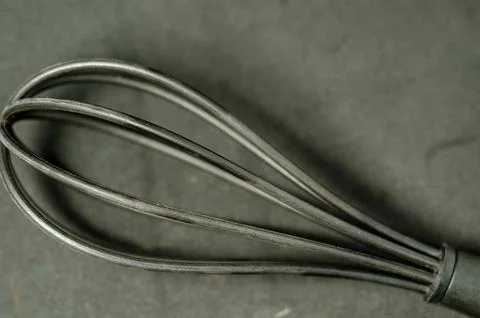 Minimalist composition highlights kitchen tool&amp;#039;s form. Stock Photos