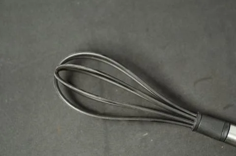 Minimalist composition highlights kitchen tool&amp;#039;s form. Stock Photos
