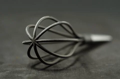Minimalist composition highlights kitchen tool&amp;#039;s form. Stock Photos
