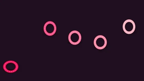 Minimalist composition of soft pink circles arranged on a dark background 库存影片 336262515