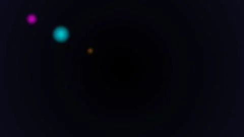 Minimalist composition of three small glowing orbs on a dark black background Stock Footage 335117315