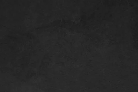 Minimalist dark charcoal surface texture with empty space Stock Photos
