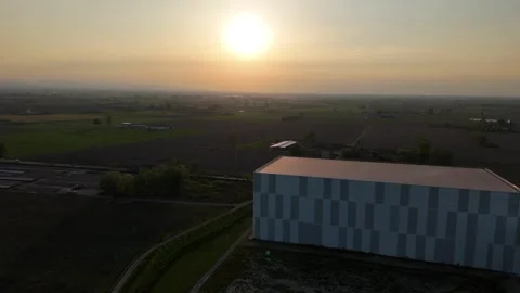 Minimalist data center architecture Po Valley Piacenza sunset aerial Stock Footage 334089884