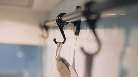 Minimalist design and functionality showcased by a beige kitchen towel hangin 写真素材