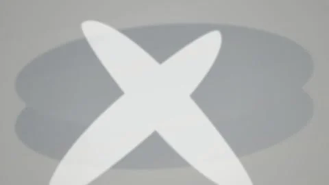 Minimalist four pointed star layered over a vertical oval shape Stock Footage 340877446