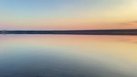 Minimalist Gradient Sunset Sky Reflected In Water Stock Footage 341755916