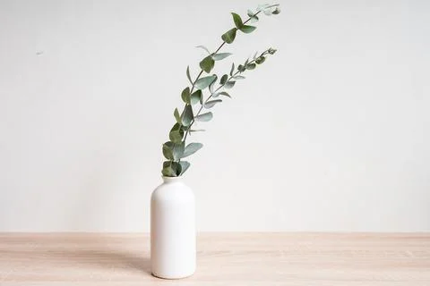 Minimalist home decor with empty frame mock-up on white wall background Stock Photos