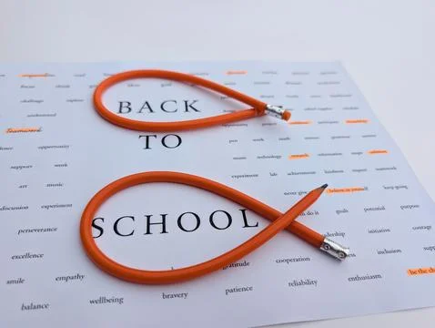 Minimalist horizontal back to school concept featuring a single sheet of pape Stock Photos