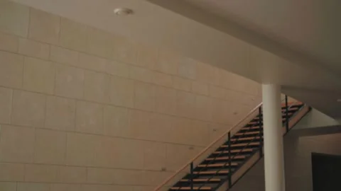 Minimalist interior architecture with stone wall and horizontal windows 스톡 동영상 326451193