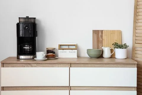 Minimalist kitchen countertop with coffee maker and kitchenware Stock Photos