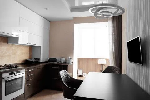 Minimalist kitchen interior with built-in electronics Stock Photos