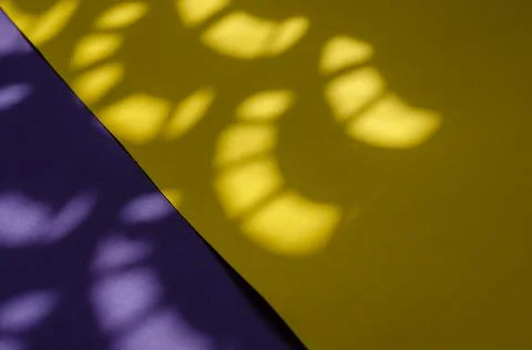 Minimalist light and shadow composition on a yellow and lilac background. Abs Stock Photos