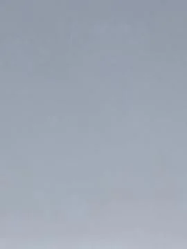 Minimalist light grey textured background with subtle grain. Foto stock