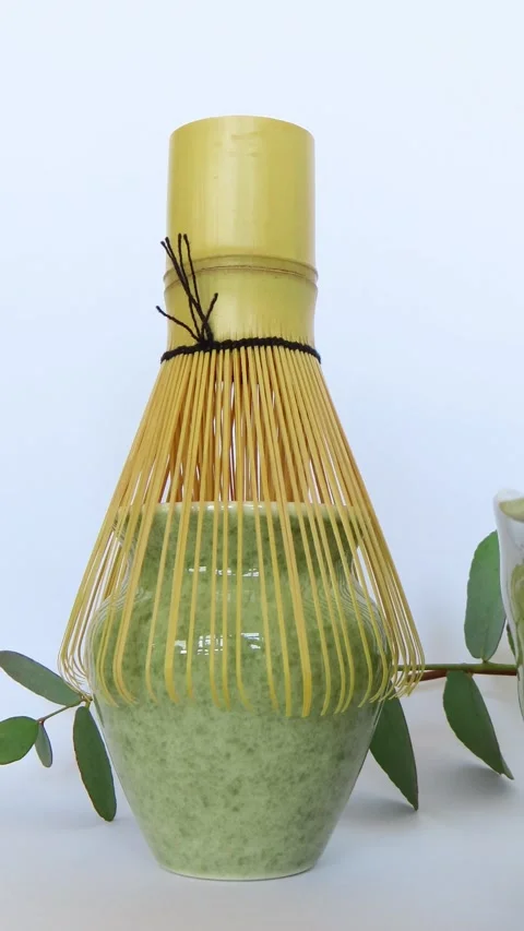 Minimalist Matcha Tea Ceremony Setup with Ceramic Tea Kit and Natural Decor 스톡 동영상 335640957